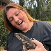 Nicole Spencer holding a reptile